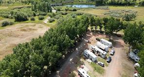 LIVE! WORK! FUN! Seasonal RV sites for sale Southern Alberta - full services on 4.84 Acres...
