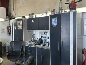 cabinets and workbenches included