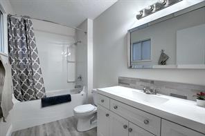 Unit #1 - bathroom. Comes fully furnished.