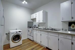 Unit #1 - Kitchen w Combination Washer Dryer. Comes fully furnished.