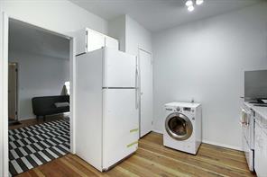 Unit #1 - Kitchen w Combination Washer Dryer. Comes fully furnished.