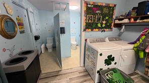 Upstairs bathrooms (3 toilets) Laundry area!