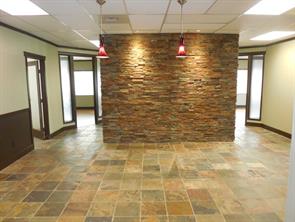 #201, 1,780 sq.ft. move in ready, Large receiption with tile floors and stone backdrop