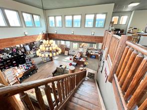 Custom  built solid log staircase and railing