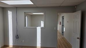 Window from office to entry area