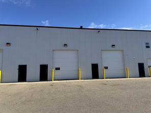 REAR MAN AND GARAGE DOORS