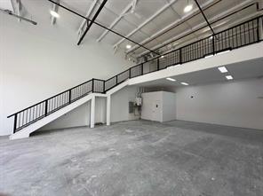 Mid construction with mezzanine and stairs in