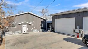 SHOP & BACK OF RESIDENCE W/ STOREFRONT