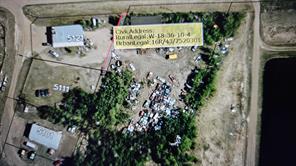 SMALL LOT BEHIND SHOP