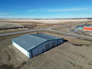 corner of highway & main entrance to Acme