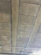 Ceiling is rebar reinforced cinder brick to allow for vertical expansion