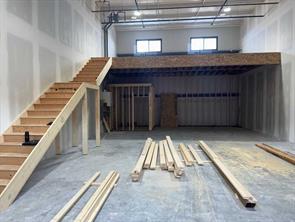 Stairs and mezzanine going in one of our units in Heather Glen